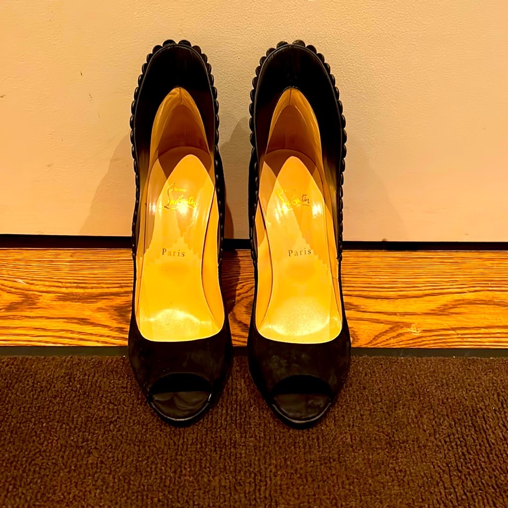 Almost new pair of Christian Loubiton suede heels